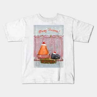 Merry Christmas greeting winter card with cute fluffy cats in red Santa hats and scarves Kids T-Shirt
